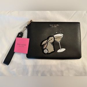 Kate Spade Wristlet Pouch with bunny and cocktail glass design.